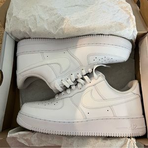 All white Nike Air Force 1’s